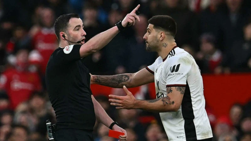 With the coach being punished red card and suspended for how many games?